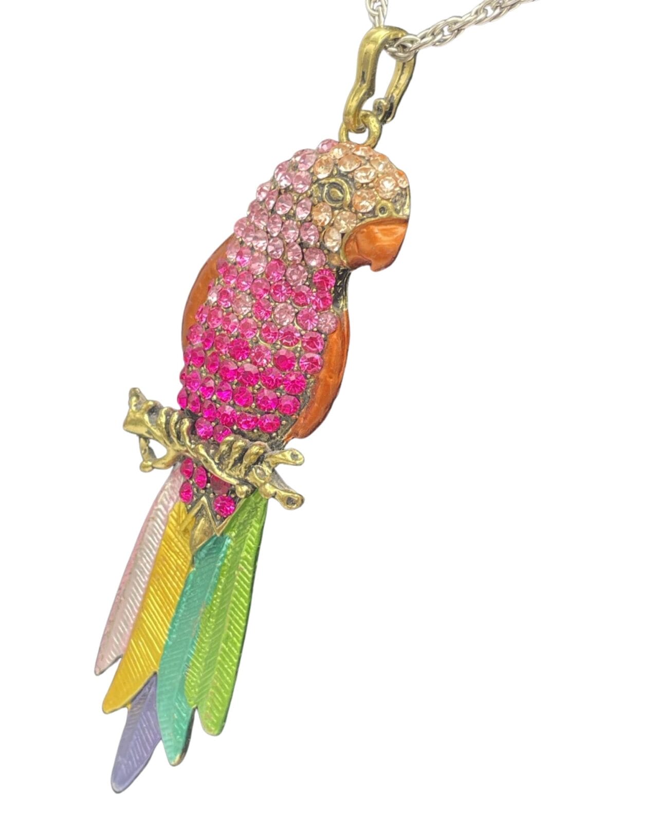 An Elegant Pink Rhinestone Parrot Pendant Necklace with Silver Chain on a gold chain.